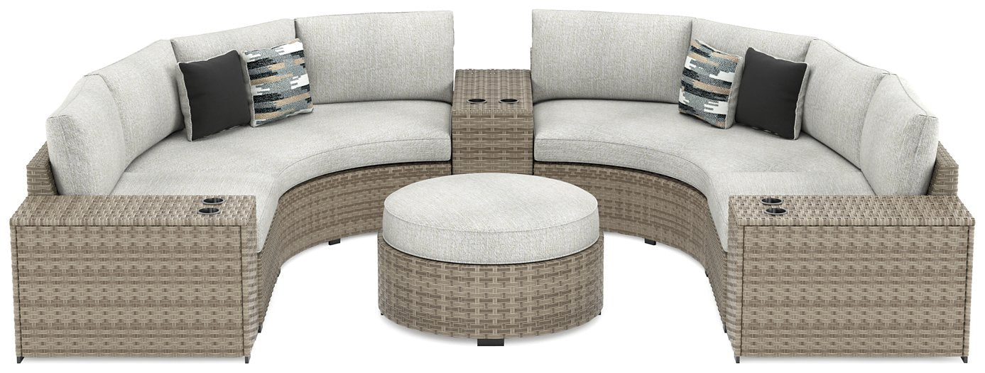 Calworth 7-Piece Outdoor Sectional with Ottoman